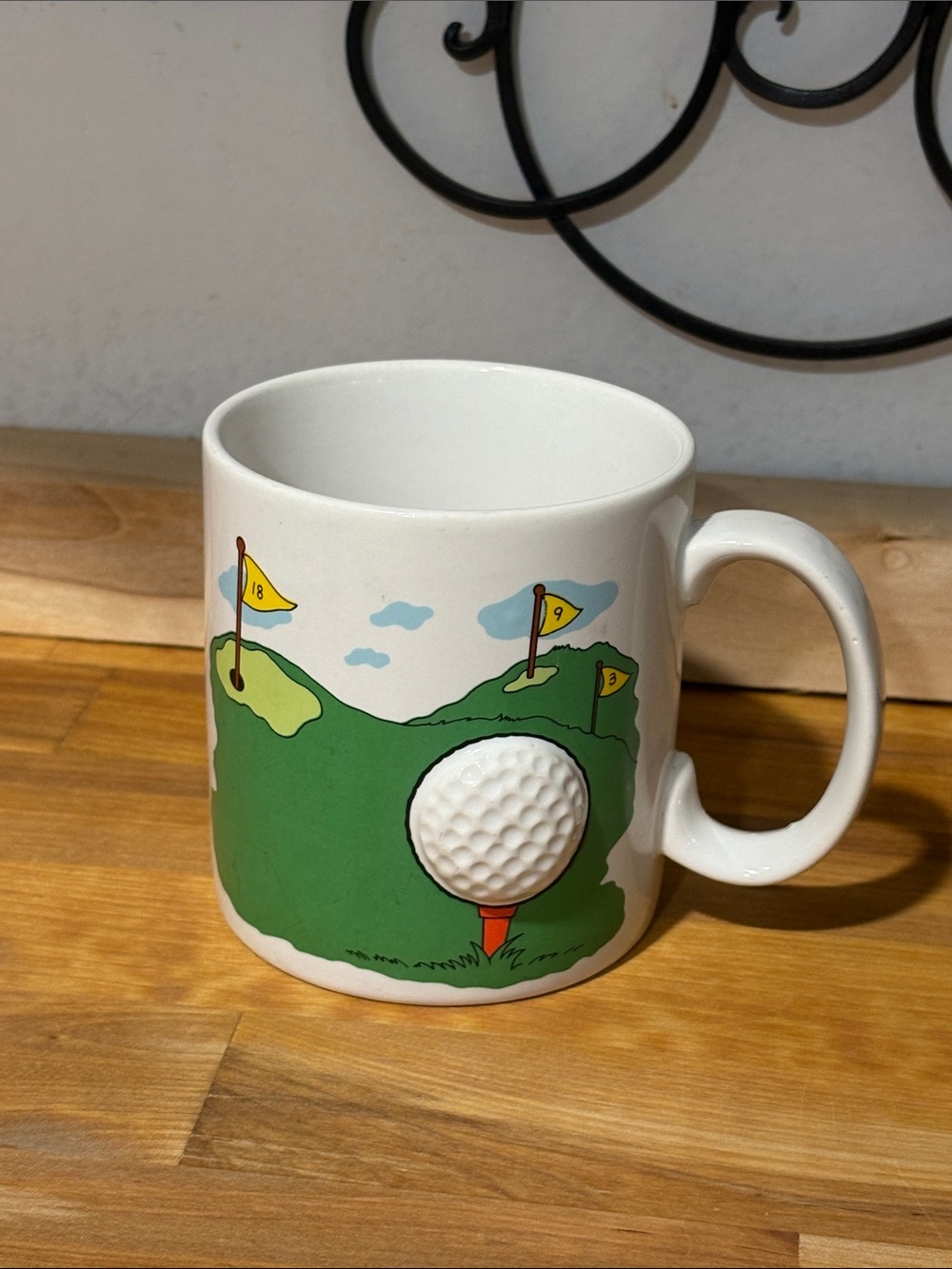 Russ White Ceramic Golf Mug with Green Course and Yellow Flags